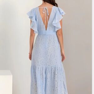 Tiered Ruffle Sleeve Maxi Dress features a stunning light blue fabric with eyele